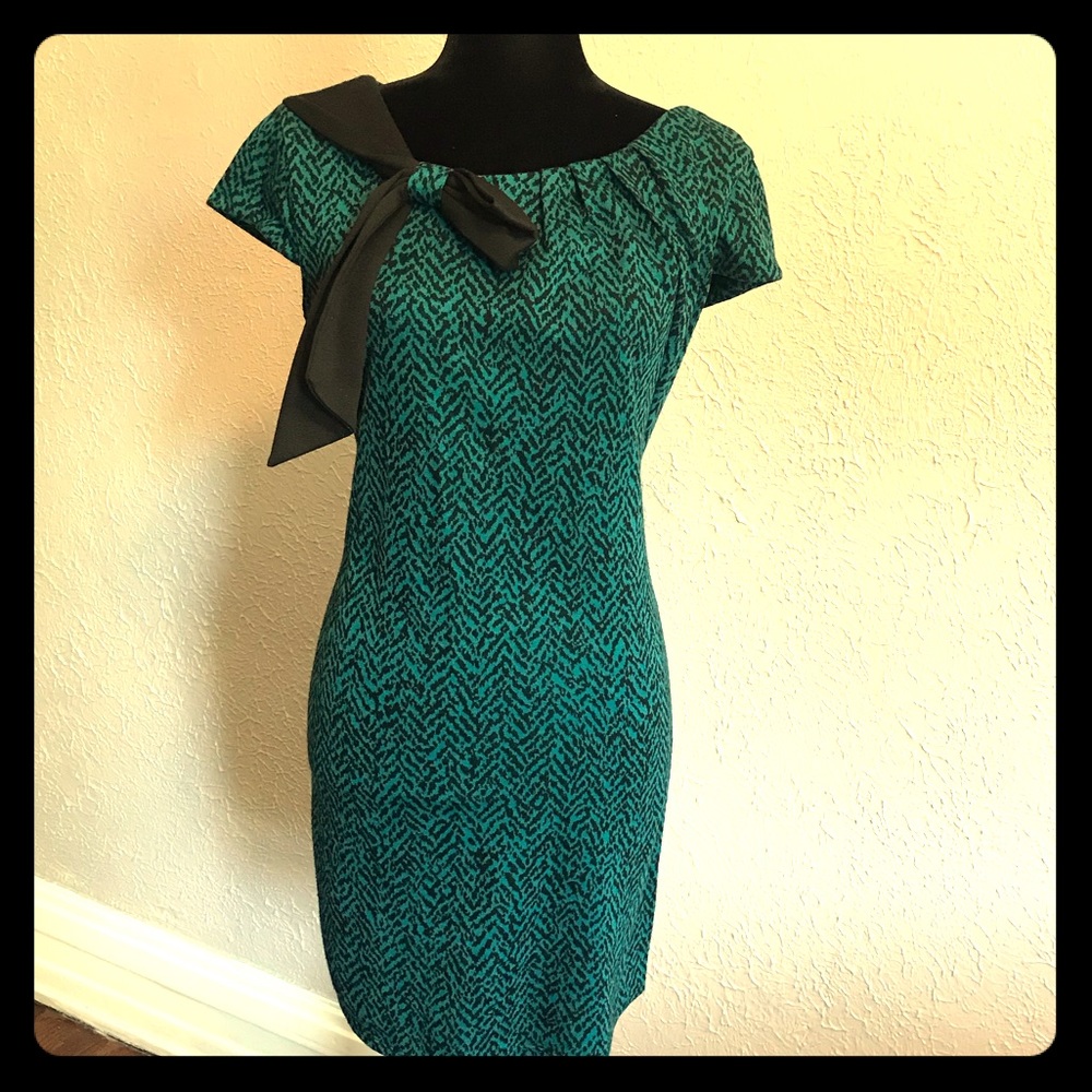 Size 10 teal animal print dress with bow.